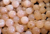Perles Minéraux Pierre de lune orange  6,7mm